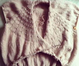Photo of a Vitamin D Cardigan Sweater knit using short rows.